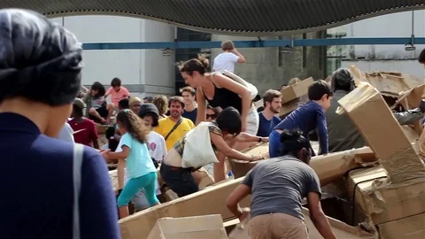 Public event with carton boxes Stock Footage 78532201