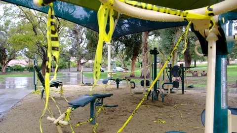 Public Exercise Equipment With Caution Tape Stock Footage 128070972