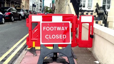 Public footway path closed red sign with barrier Stock Footage 343751870