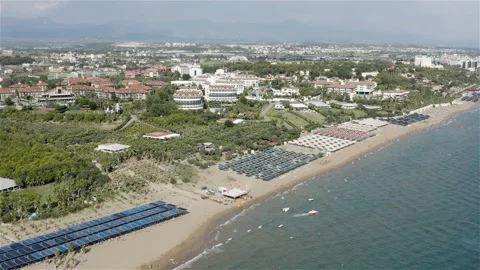 Public free beaches in Side at large hotels with developed infrastructure Video stock 118639140