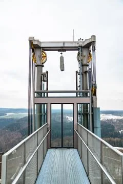 Public glass elevator on viewing platform outdoor Stock Photos