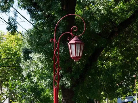 Public lighting in a green square Stock Photos