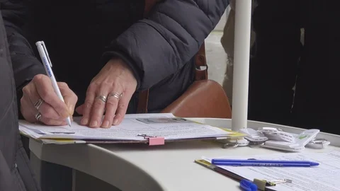 Public petition signing  Stock Footage 124074627