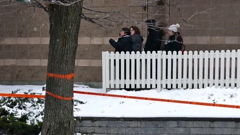 Public pointing at crime scene Stock Footage 101990391