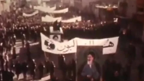 Public protest scenes during Iranian Revolution unfolding in Tehran Stock Footage 325855733