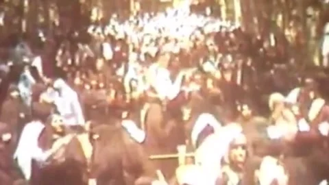 Public protest scenes during Iranian Revolution captured in urban Tehran Stock-Footage 325858676