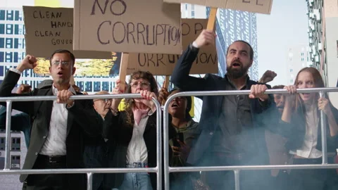 Public protest showing people marching against corruption and bad governing Stock Footage 327172943