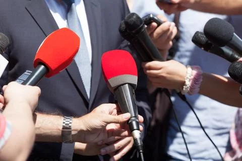 Public relations - PR. Media interview. News conference. Stock Photos