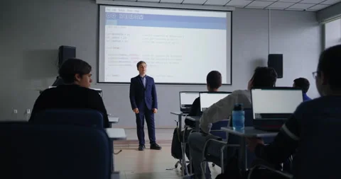 Public Speaking In Classroom, Boy Presenting Project In Programming Courses Stock Footage 280176386