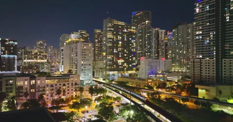 Public train system in urban landscape of downtown Miami Brickell in Florida Stock Footage 317107996
