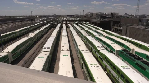 Public transit commuter trains sit parked during COVID 19 pandemic recession Stockbeeldmateriaal 154150504