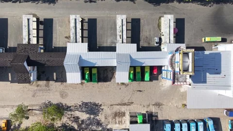 Public transport buses lined up at the transit terminal Stock Footage 345962507