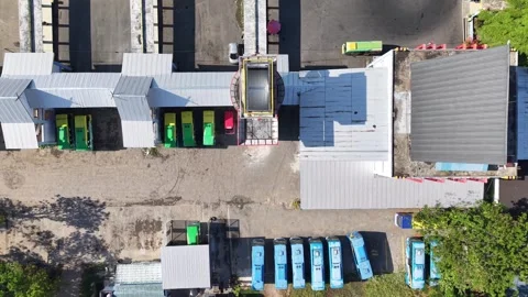 Public transport buses lined up at the transit terminal Stock Footage 345962551