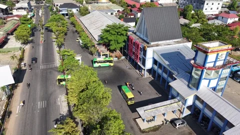 Public transport buses lined up at the transit terminal Stockbeeldmateriaal 346593770