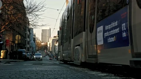 A public transport Tram moving forward in brussels - Ixelles 4K Stock Footage 234197829