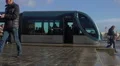 Public transportation, passengers coming out of modern trolley car, cityscape HD Footage