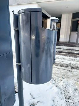 Public Trash Bin at Bus Stop in Winter Stock Photos