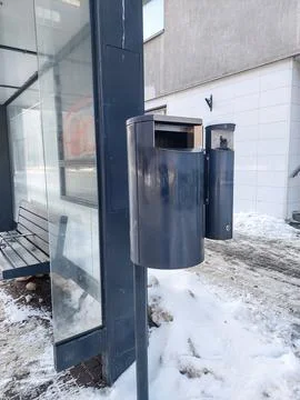 Public Trash Bin at Bus Stop in Winter Stock Photos