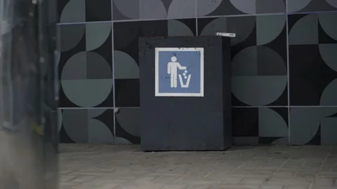 Public Trash Can with Recognizable Sticker for Waste Disposal. Stock Footage 314134482