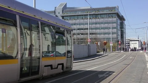 Public trtansport tram commute Dublin Stock Footage