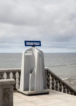  Public Urinal on seafront in Bata Public urinal for men and women on seaf... Stock Photos