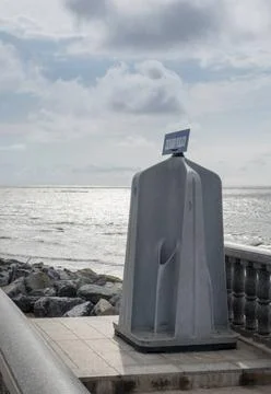  Public Urinal on seafront in Bata Public urinal for men and women on seaf... Stock Photos