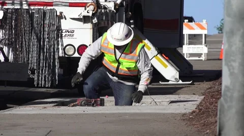 Public Utilities Electrical Power, underground worker Stock Footage 61274423