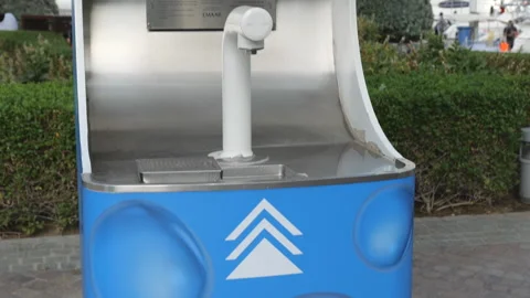 A public water refill station for reusable bottles. Stock Footage 333472332