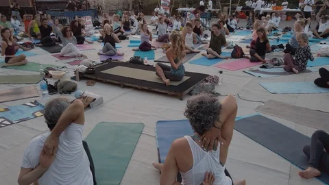 Public Yoga lesson in slow motion Stock Footage 116720976