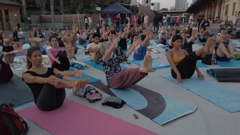 Public Yoga lesson in slow motion Stock Footage 116727121