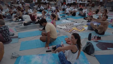 Public Yoga lesson in slow motion Stock Footage 116731498