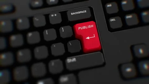 Publish red button on keyboard. A finger presses Publish. Click publish. Close Stock Footage 270401439
