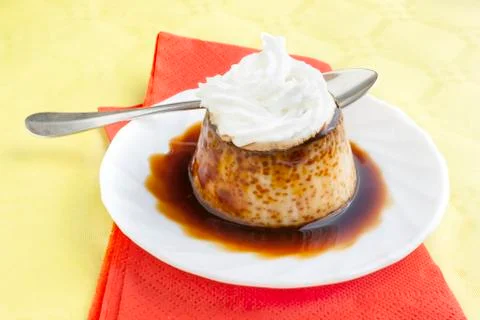 Pudding with cream and syrup Stock Photos