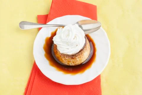 Pudding with cream and syrup Stock Photos