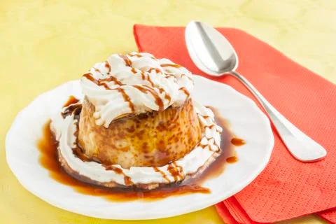Pudding with cream and syrup Stock Photos