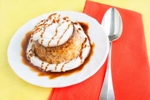 Pudding with cream and syrup Stock Photos