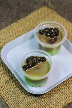 Pudding green tea latte with bubble	 Stock Photos
