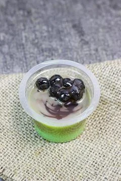 Pudding green tea latte with bubble	 Stock Photos