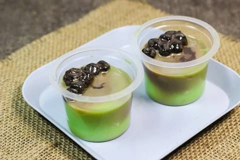 Pudding green tea latte with bubble	 Stock Photos