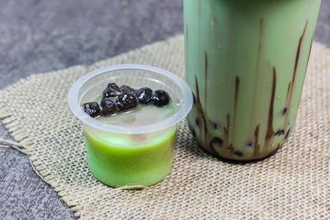 Pudding green tea latte with bubble	 Stock Photos