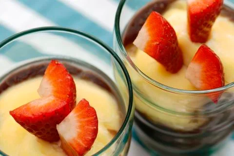Pudding with strawberries Stock Photos