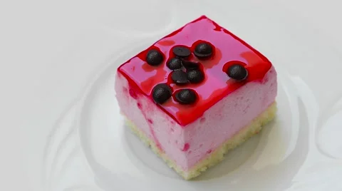 Pudding with strawberry jam and chocolate decoration, top view Stock Footage 54338162
