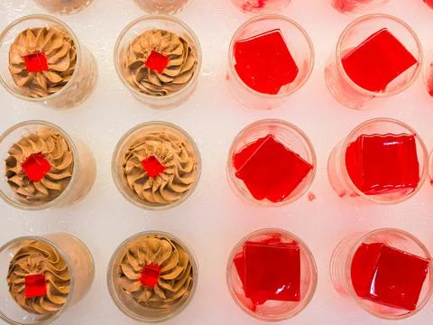 Pudding with white ice background Stock Photos