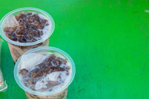 Puddings in plastic containers Stock Photos