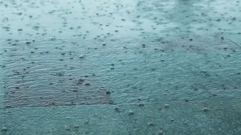 Puddle and drops of water on a marble Stock Footage 76517999