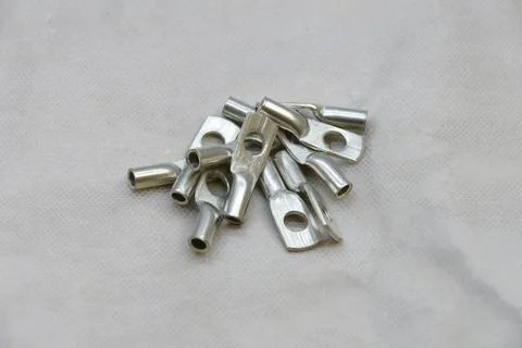 Puddle cable tips for crimcompressing multi-stranded wires Stock Photos