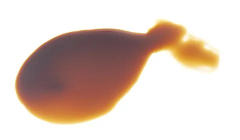 Puddle of engine oil isolated on white background. 스톡 사진