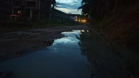 Puddle potholes Stock Footage 325631649