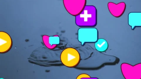 Puddle receiving droplet, forming crown splash while hearts, bubbles, play icons Stock Footage 333903083