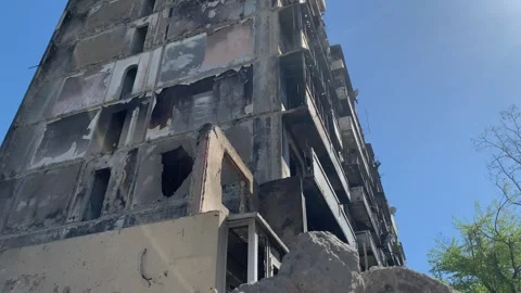 From puddle reflection to ruined house Stock Footage 306557228